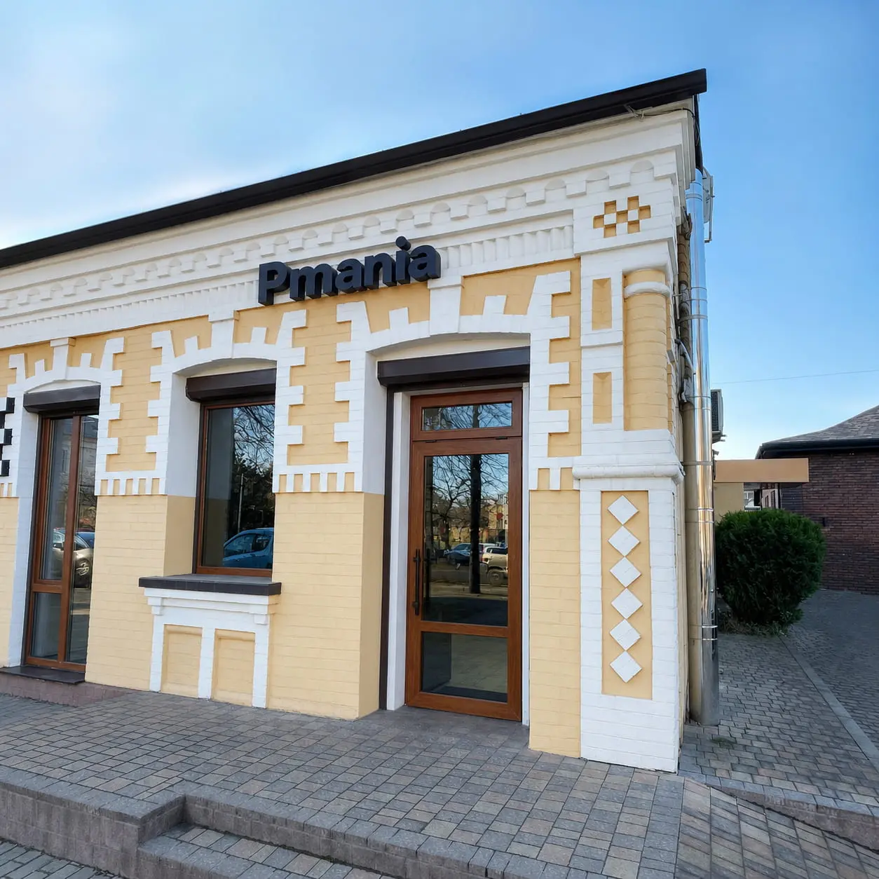 Фасад магазину Pmania та точки приймання смартфонів у ремонт у Рівному